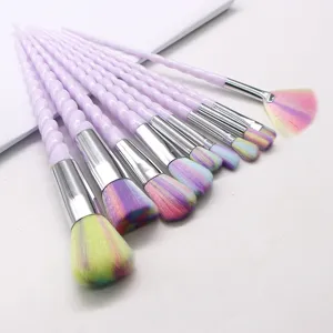 10-piece unicorn makeup brush set with colorful gradient bristles and spiral handle.