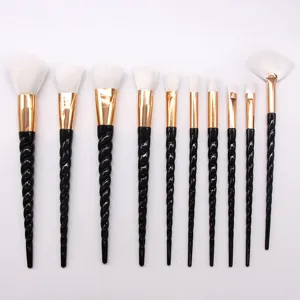 10-piece unicorn makeup brush set with black spiral handles and soft white bristles for daily use.