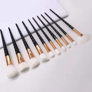 10pcs professional unicorn makeup brush set with black spiral handles and soft white bristles.