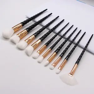 10-piece unicorn makeup brush set with black spiral handles and soft white bristles for beauty.
