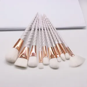 Details of 10-piece unicorn makeup brush set with white spiral handle and soft bristles.