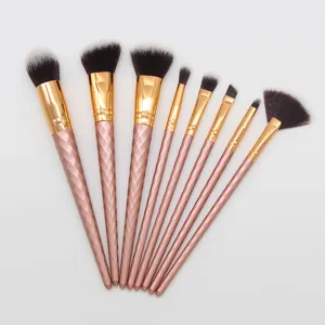 Detailed view of the 8-piece rose gold makeup brush set featuring elegant diamond handles.