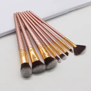 8-piece rose gold threaded handle makeup brush set detail view with soft synthetic bristles.