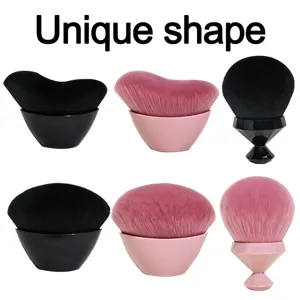 Makeup brush detail showing unique wave and diamond shapes for flawless powder and blush application.