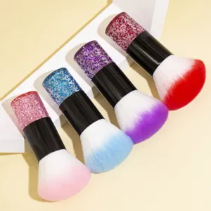 Detailed view of soft bristle makeup brushes featuring sparkling glitter crystal handles for makeup.