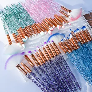 Colorful crystal handle makeup brush set with eyeshadow and contour brushes for beauty.