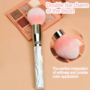 Large soft makeup brush for powder and blush with elegant marble handle for daily beauty routine.