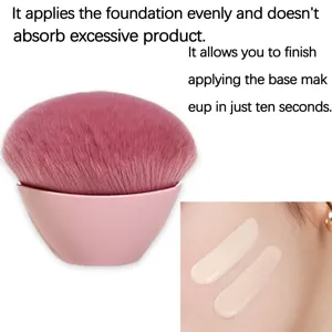 Large pink mushroom makeup brush for smooth liquid foundation and loose powder application.