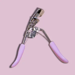Stainless steel eyelash curler with ergonomic pink grip handles for curling lashes naturally.