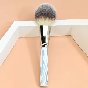 Detail shot of the large soft powder makeup brush showing dense bristles and stylish handle.