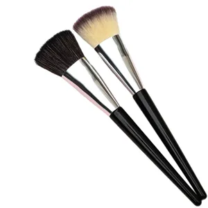 Professional flat head makeup foundation brush and blush tool with soft bristles for daily beauty.