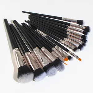 Professional 16-piece makeup brush set featuring soft gradient bristles and sleek black handles.