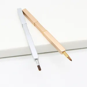 Portable retractable makeup lip brush detail view, metallic finish, mini cosmetic tool.