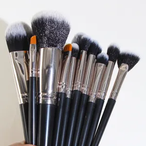 Professional 16-piece makeup brush set featuring soft synthetic bristles and sleek black handles.