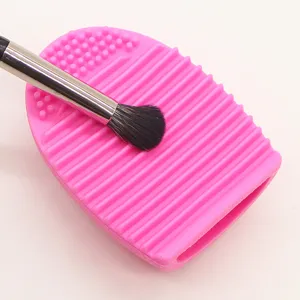 Close-up detail of a pink silicone makeup brush cleaner egg for daily beauty care routines.