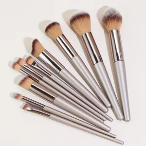 Champagne 10-piece makeup brush set with soft dual-color bristles for perfect daily cosmetics.