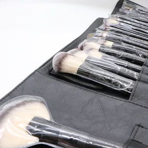 Professional 24-piece black makeup brush set with leather roll pouch, soft bristles, ideal gift.