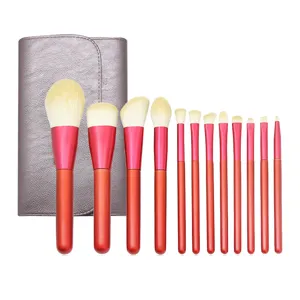 Detail view of the 12-piece makeup brush set featuring vibrant red handles and soft white bristles with case.