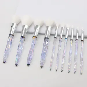 Close-up of 10pcs makeup brush set with crystal diamond handles and soft white bristles.
