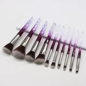 Detailed close-up view of the 10-piece diamond crystal makeup brush set in purple.
