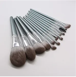 Close-up detail of soft makeup brush bristles and silver handle ferrule design for precision.