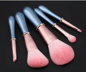 5-piece rhinestone makeup brush set with blue handles and pink soft bristles for precise face makeup.