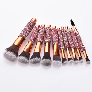 Detailed view of the 10-piece sparkly rhinestone makeup brush set with soft bristles.