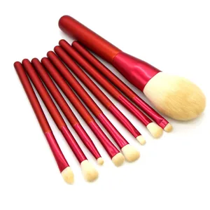 Professional red makeup brush set with soft bristles for flawless blending and application.