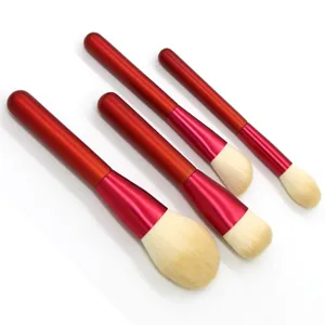 Detailed close-up view of the Chinese red makeup brush set featuring four assorted sizes.