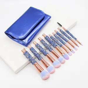 10-piece glitter makeup brush set with matching blue storage bag, sparkling design.