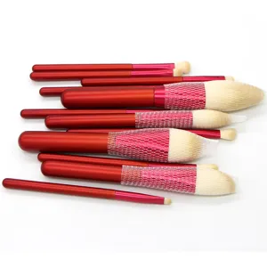 12-piece red makeup brush set detailed view, professional cosmetic tools with soft bristles.