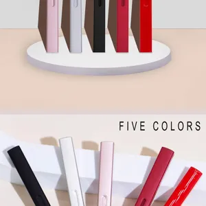 Portable retractable lip brush makeup tool in five colors for precise lipstick application.