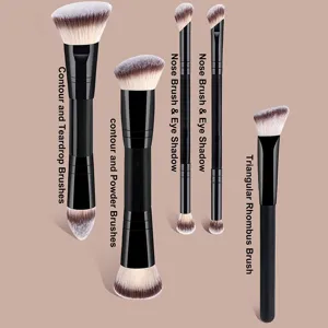 Vista detallada y profesional de varios pinceles de maquillaje dobles para el contorno.