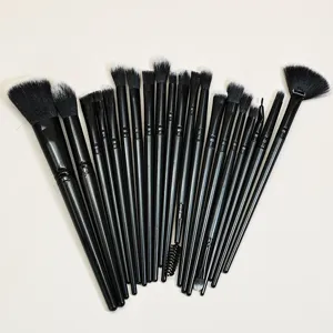 Professional 20-piece black makeup brush set, detailed view of various eye and face brushes.