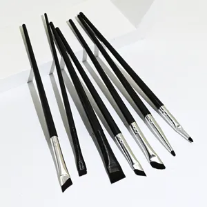 Professional eye makeup brush set featuring black handles, angled eyebrow and fine eyeliner brushes.