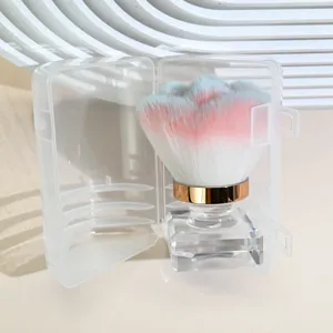 Detailed close-up of the rose shaped makeup brush with gradient bristles in a case.