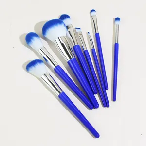 Professional 8-piece blue makeup brush set detail view, featuring soft gradient bristles.