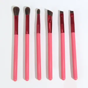 6-piece makeup brush set with pink handles and red ferrules for eye and eyebrow application.