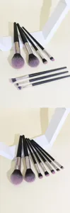 7-piece black makeup brush set with soft bristles for face powder and eyeshadow.