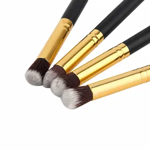 Set of 4 small eyeshadow brushes with black handles and gold ferrules for precise eye makeup.