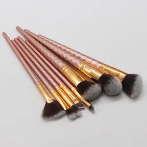 Detail view of 8-piece rose gold makeup brush set with diamond handles and soft bristles.