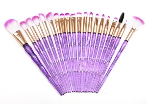 20-piece purple glitter makeup brush set with soft synthetic bristles for professional use.