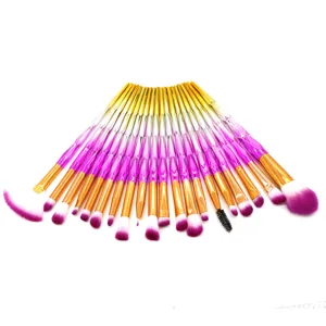 Detailed view of the 20-piece gradient pink makeup brush set with diamond cut handles.
