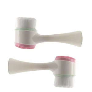 Brosse nettoyante pour le visage double face avec poils doux et picots en silicone.