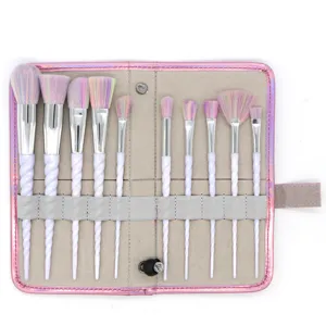 10-teiliges Einhorn Make-up Pinselset mit bunten Borsten und rosafarbener Tasche.