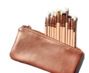 12-piece eye makeup brush set with rose gold cosmetic pouch for professional eyeshadow application.