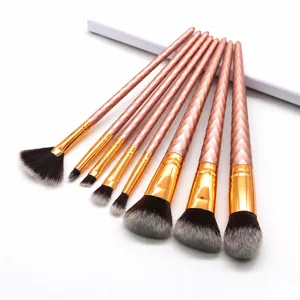 8-piece rose gold threaded makeup brush set for professional facial and eye beauty application.