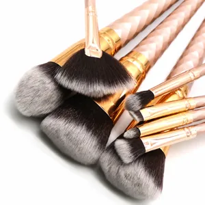 8-piece rose gold makeup brush set with spiral handles, professional beauty tools for face and eyes.