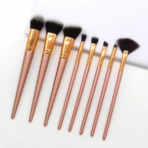 8-piece rose gold makeup brush set with threaded handles for professional daily face and eye makeup.