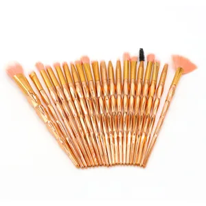 Details of the 20-piece rose gold diamond handle makeup brush set showing fine bristles and handles.
